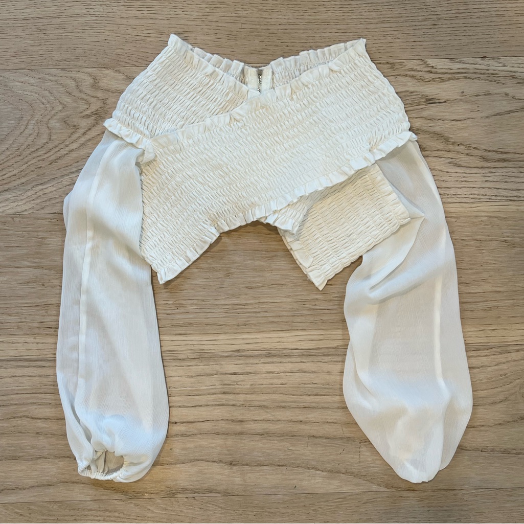With Jean White Smocked Off-Shoulder Crop Top With Sheer Bishop Sleeves